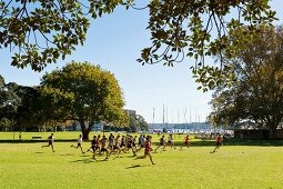 People doing rugby training near Rushcutters Bay in Sydney, New South Wales, Australia