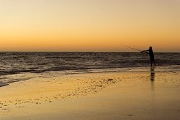 Man fishing in sea at Kalbarri National Park, Cervantes, Australia