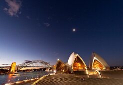 View of Opera House and Harbour Bridge at night in Sydney, New South Wales, Australia