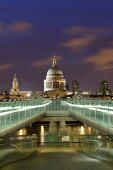 View of Millennium Bridge, Tate Modern and St Paul's Cathedral at dusk, London, UK