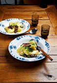 Ravioli with green cabbage and melt onion on plate