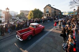 People standing on bridge of Camden Market, London, UK