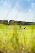 Küchenchef Jens Rittmeyer spielt Golf auf dem Golfplatz Budersand