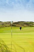 Küchenchef Jens Rittmeyer spielt Golf auf dem Golfplatz Budersand