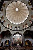 Low angle view of pilgrims and Dome Altar at Church of Annunciation, Nazareth, Israel