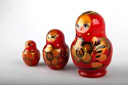 Colourful Russian dolls on white background