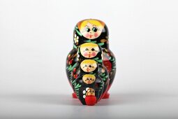 Colourful Russian dolls on white background