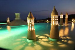 Man swimming in pool of Kempinski Hotel Barbaros Bay in Aegean, Turkey