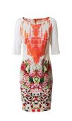 Floral patterned white summer dress against white background