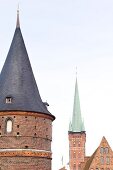 Lubeck's Holsten and St. Mary Church in background at Lubeck, Schleswig Holstein, Germany