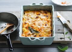 Pumpkin bake with bacon and flaked almonds