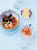 Mussels and langoustines in a curry broth and lobster soup with coconut