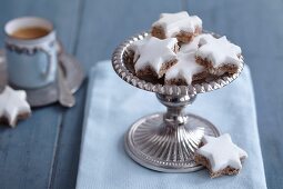 Cinnamon stars on a silver stand