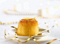An English pudding with candied orange peel for Christmas dinner