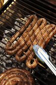 Pork sausages on a barbecue