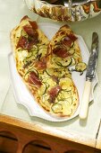 Tarte flambée with Parma ham and courgettes