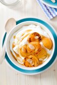 Apricots with cream, almonds and cardamom