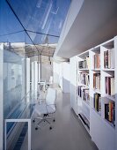 Library in front of a glass extension with contemporary architecture