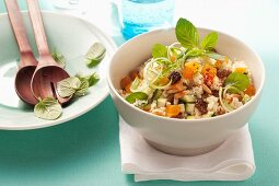 Couscous salad with courgette, dried fruits and pine nuts