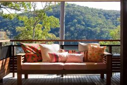 Sofa with scatter cushions on terrace