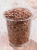 Brown laird lentils in a glass