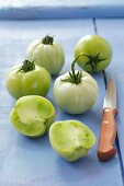 Green tomatoes, whole and halved