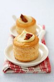 Vol au vents filled with hummus and dried tomatoes