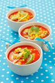 Cold tomato soup with avocado, sweetcorn and lime