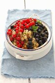 Redcurrants, whitecurrants and blackcurrants in a bowl