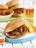 Flank Steak Sandwiches with Peppers; With Chips and Beer