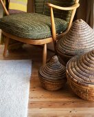 Set of baskets next to 50s-style armchair