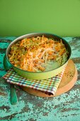 Macaroni cheese with pumpkin and spring onions