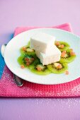 Ice cream on sliced kiwi fruit