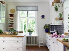 Country-house kitchen with white fronts