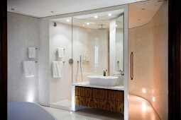 Bathroom with washstand and shower cubicle