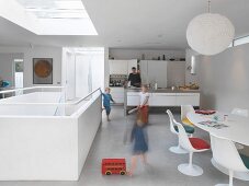 Family with children in open-plan living room