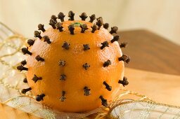 An orange pierced with cloves