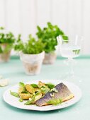 Fried trout with roast potatoes and spinach