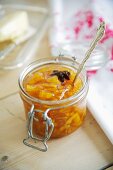 A jar of marmalade with star anise