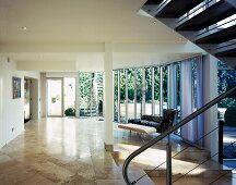 Hall with glass wall and staircase