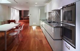 Open-plan living with dining and kitchen areas