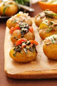Jacket potatoes with various fillings (courgette, tomatoes, tuna)