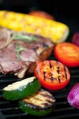 Steak and vegetables on a grill