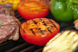 Steak and vegetables on a grill