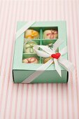 Heart-shaped white chocolates in gift box