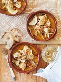 Fish and seafood casserole with picada sauce