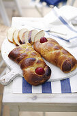 Bread plaits decorated with eggs