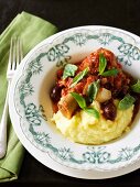 Knuckle of veal on a bed of mashed potatoes