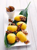 Mango with pistachios and coconut cracknel
