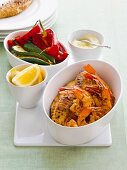 Grilled seafood with vegetables and garlic mayonnaise (Spain)